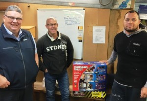 PAC member Joe Duffey (right)  receives his Trademans Tool Kit from PlaceMakers Whakatane senior account manager Peter Breen (left) and his employer Gary Fowell (middle)